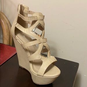 Size 8 cream-colored wedge with silver trimming